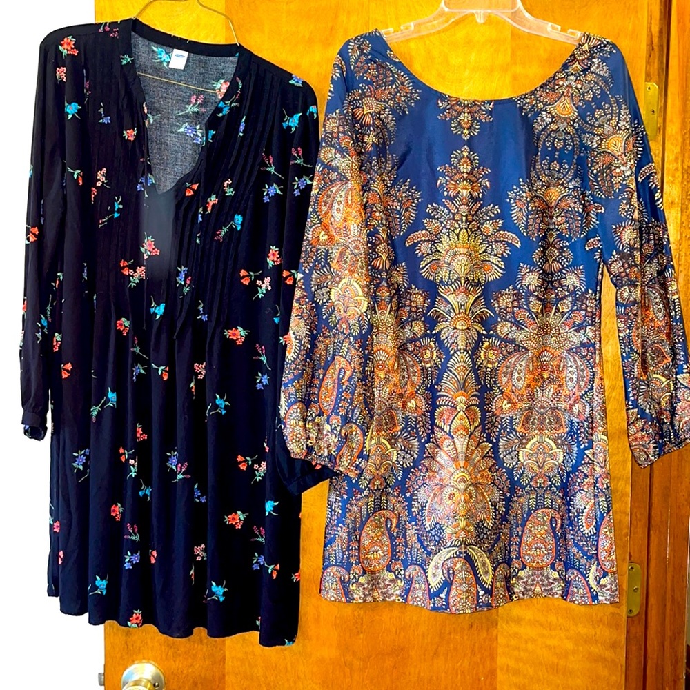 Two long sleeve midi dresses.
